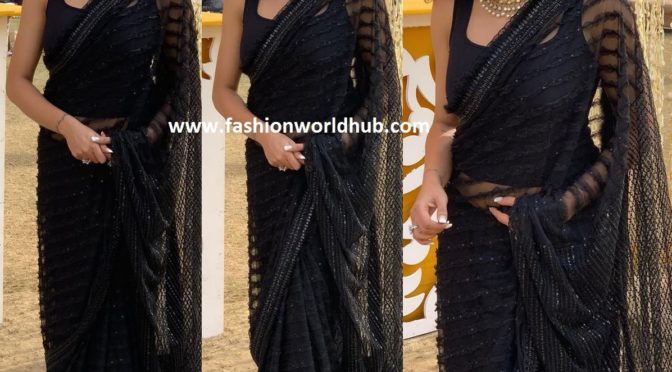 Sushmita Sen in black saree by Neeta Lulla”.