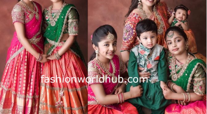 Viranica Manchu and her kids in traditional outfits at a wedding!