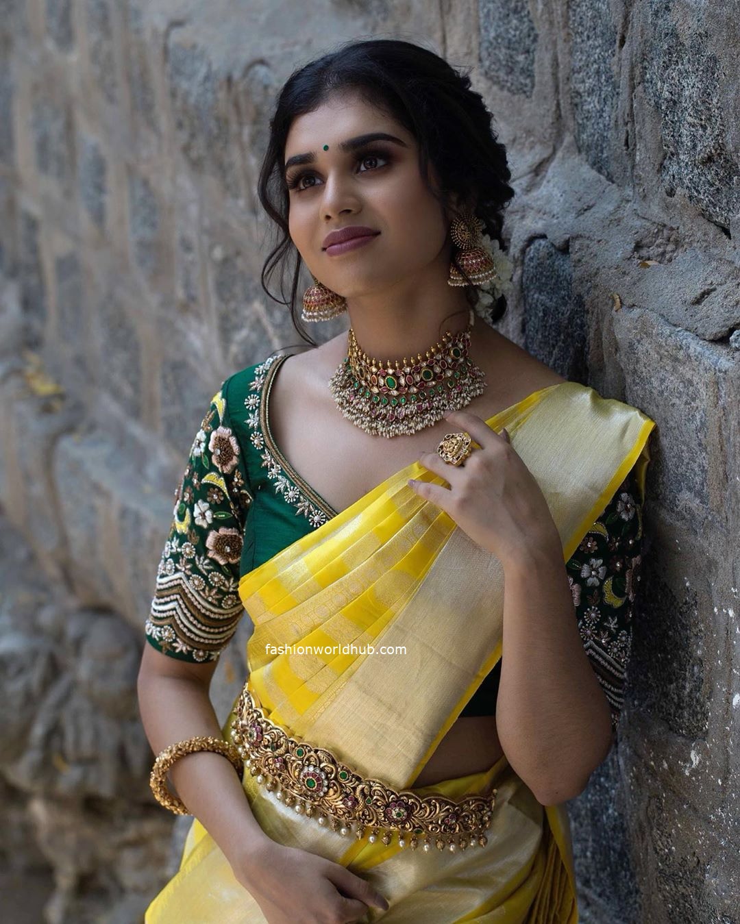 Meenakshi Govindharajan in a Traditional yellow silk saree! |  Fashionworldhub