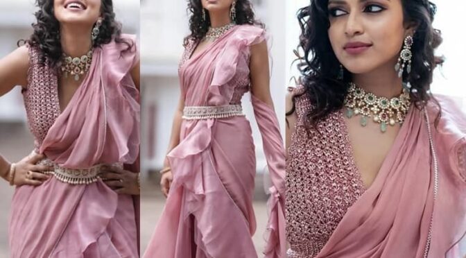 Amala Paul in a pink Pre stitched saree at her brother wedding!