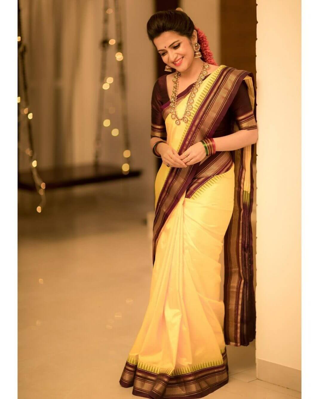 DD Neelakandan looking beautiful in a yellow silk saree! | Fashionworldhub