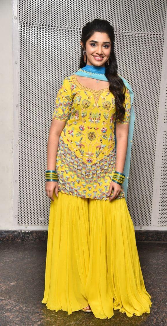 Krithi Shetty in yellow sharara set at “Bangarraju” musical night! |  Fashionworldhub