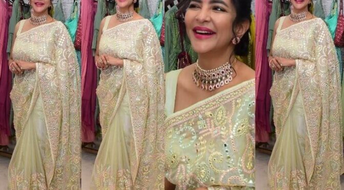 Lakshmi Manchu in pista green saree for a shop opening event!