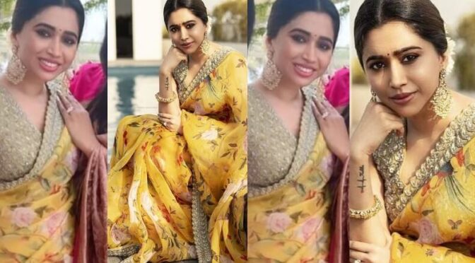 Aarti Ravi in a yellow floral print saree at Nayanthara’s wedding!