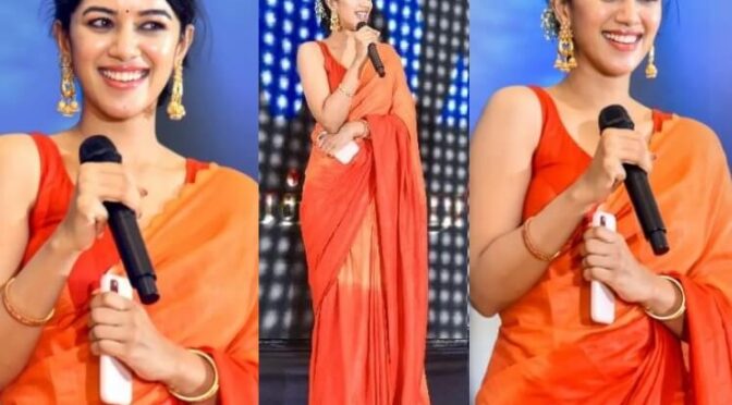 Mirnalini Ravi looks beautiful in a dual orange shaded saree at a college fest!