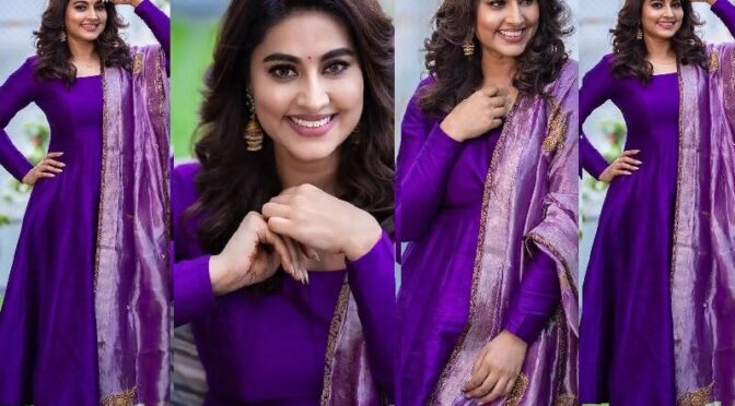 Actress Sneha prasanna looks beautiful in an violet anarkali suit