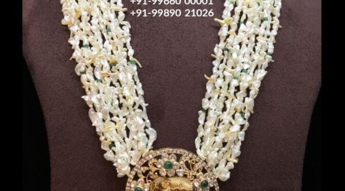Multi layered Ksea pearls with polki diamond elephant locket