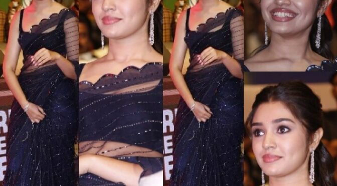 Krithi Shetty stuns in a navy blue sequinned saree!