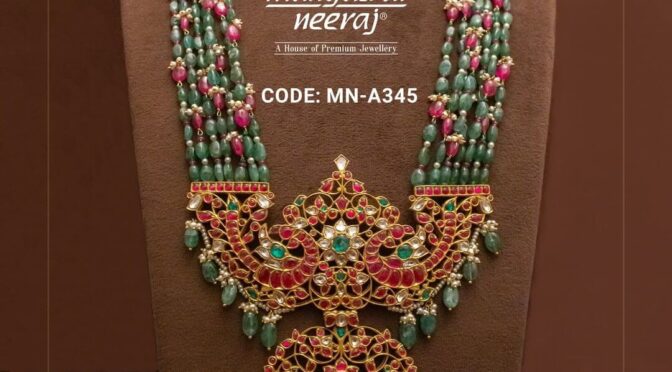 Multi Layered Emerald beads haram with peacock locket.