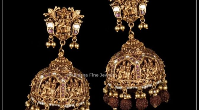 Gold Rudrakashara shiva Parvathi ear rings.