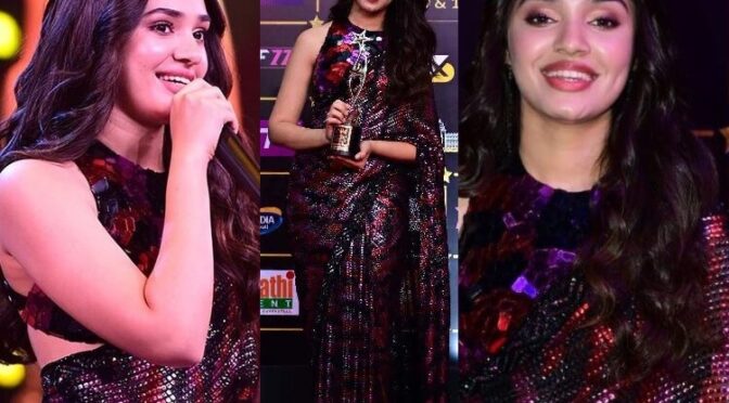 Krithi Shetty stunning looks in a black beaded saree at SIIMA’22!