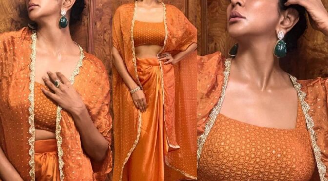 Lakshmi Manchu in an orange draped skirt with a cape!
