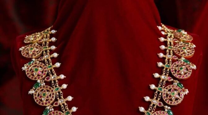 Gold ruby and emerald bottu haram.