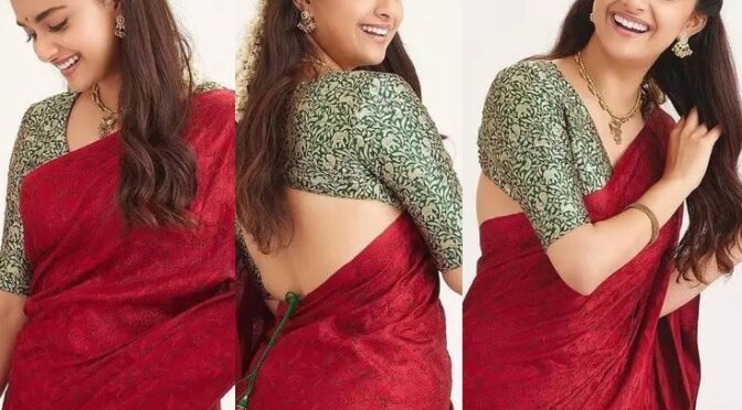 Keerthy Suresh looks beautiful in a simple red silk saree!