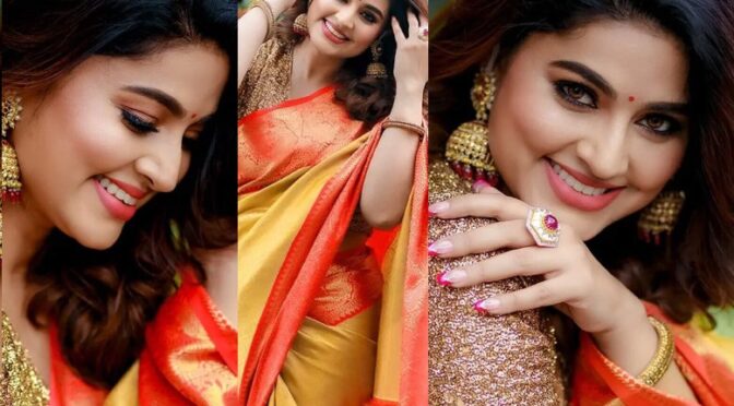 Actress Sneha prasanna looks pretty in a yellow silk saree!