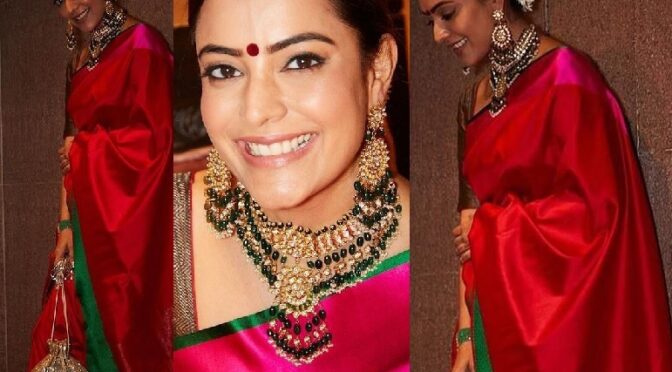 Nisha Aggarwal looks beautiful in a pink satin silk saree for a recent wedding!