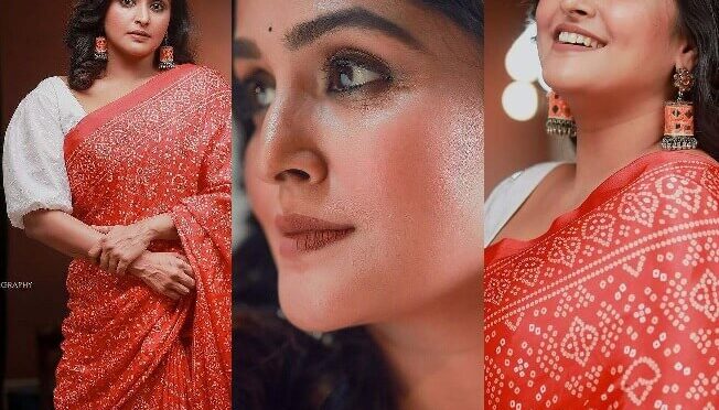 Ramya Nambessanl looks pretty in a red bandhani saree