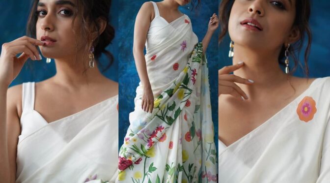 Keerthy suresh looks pretty in an ivory saree!