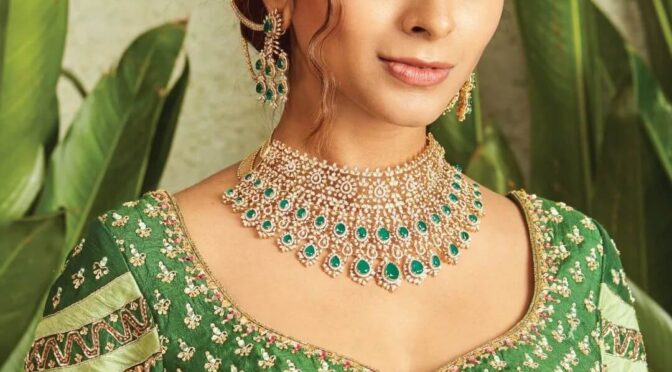 Diamond emerald necklace with earrings by Krishna jewellers.