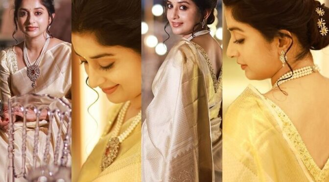 Meera jasmine looks pretty in a gold silk saree! | Fashionworldhub