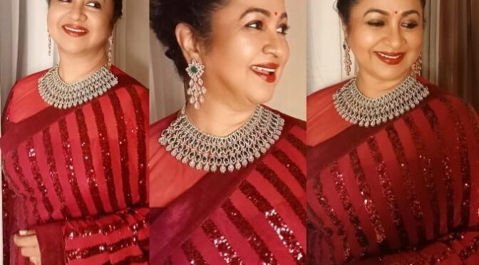 Radhika sarathkumar looks pretty in a red saree for a recent wedding!