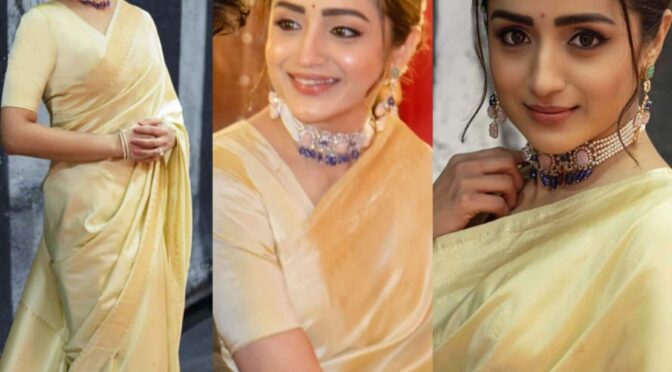 Trisha krishnan in a gold silk saree