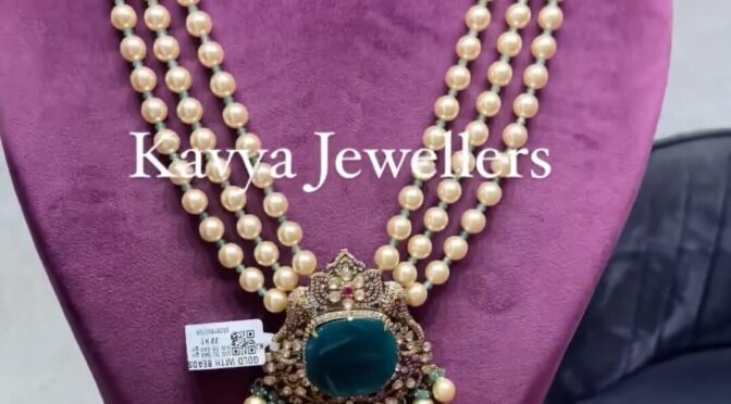 Layered pearl harm with locket by Kavya jewellers!